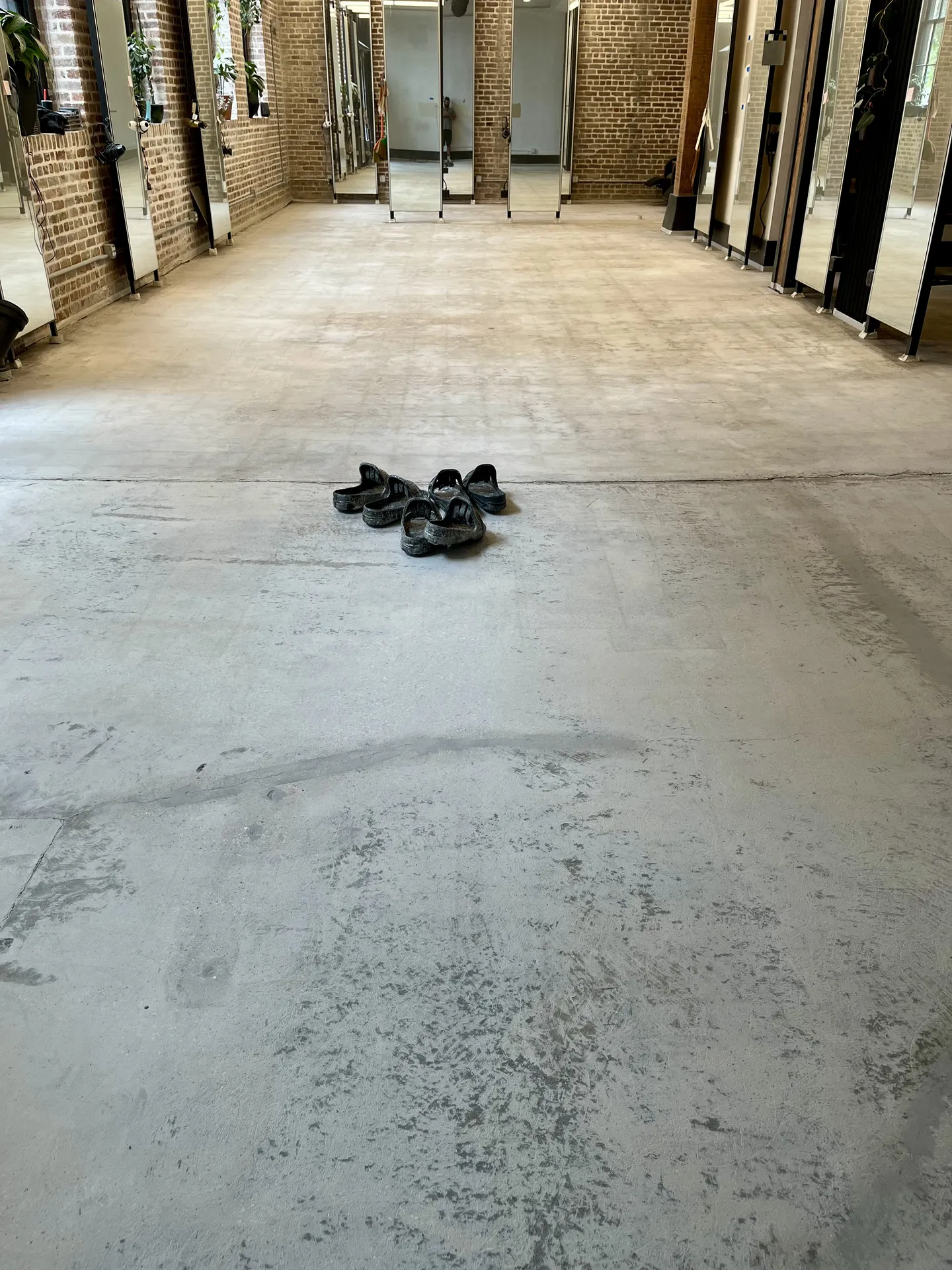 Bare unfinished concrete floor before epoxy installation